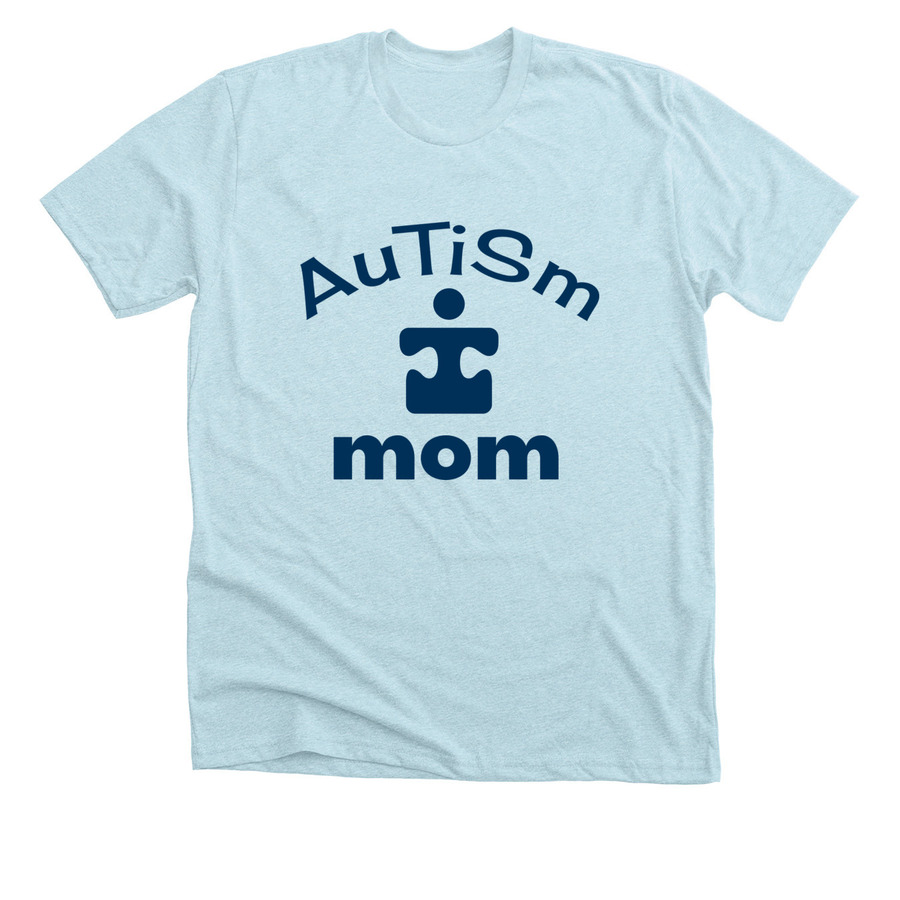 Blue autism awareness t-shirt design with text saying "autism mom" and a puzzle piece shaped like a child.