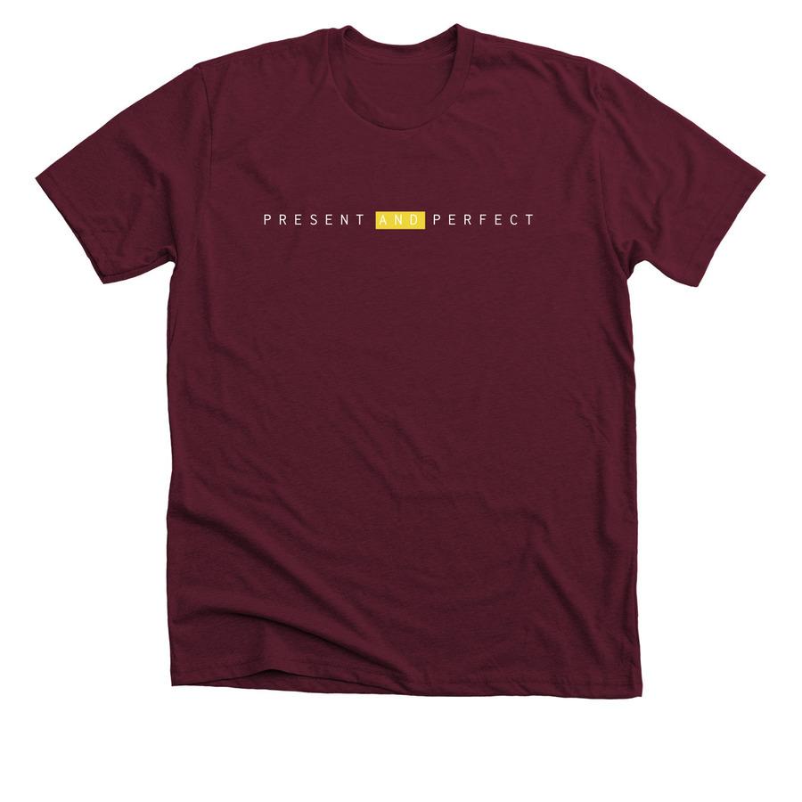 A maroon typography shirt that says, "Present and perfect".