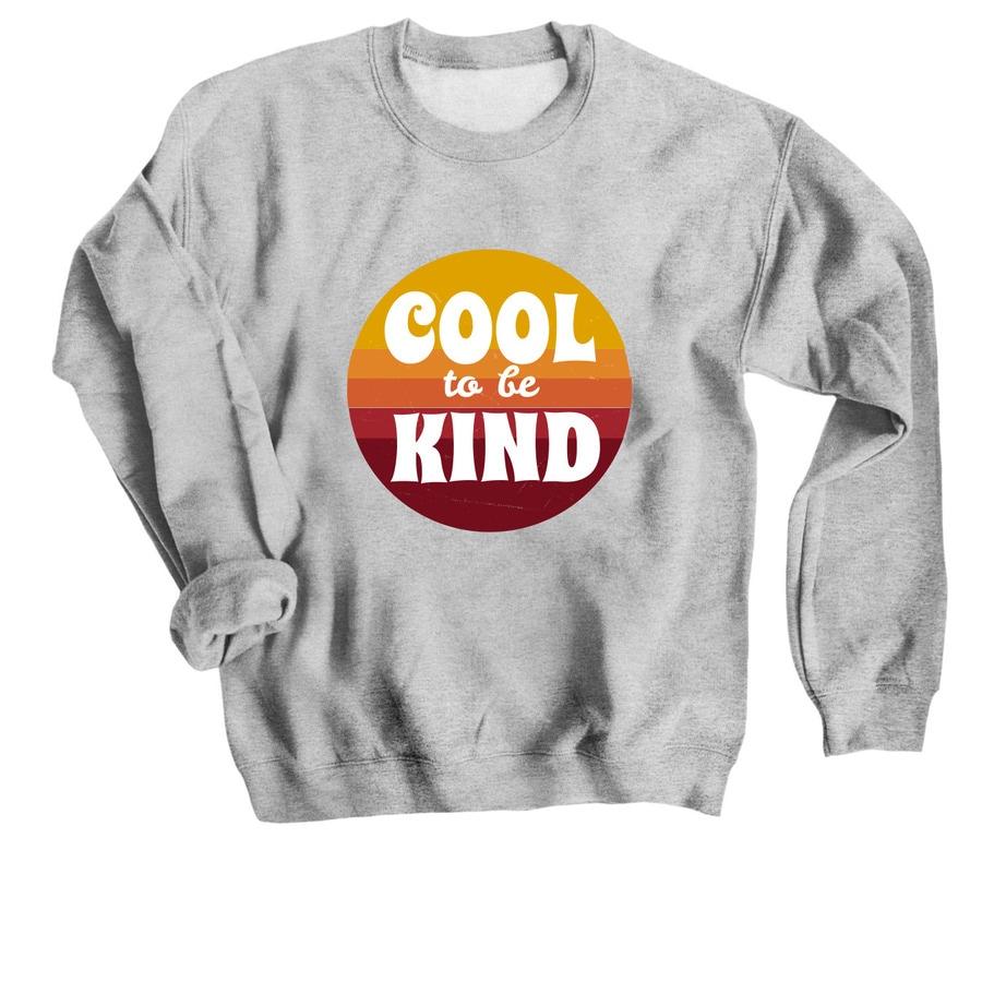 A grey retro shirt with a design that says "Cool to be kind".