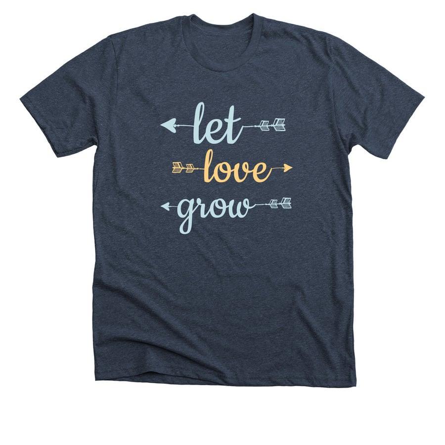 A navy blue adoption shirt that says "Let Love Grow".