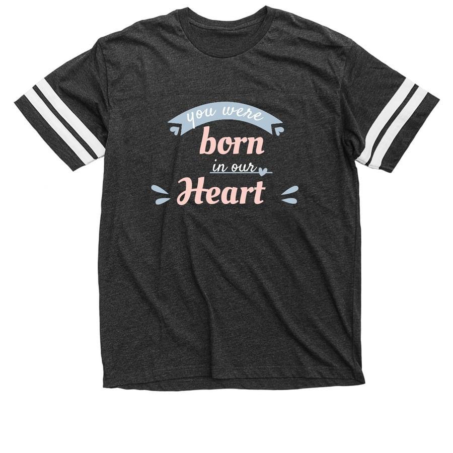 A black adoption shirt that says "You Were Born in our Heart".