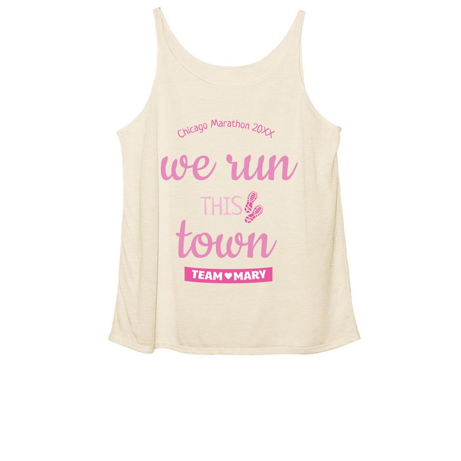 A cream-colored marathon shirt that says, "We run this town".