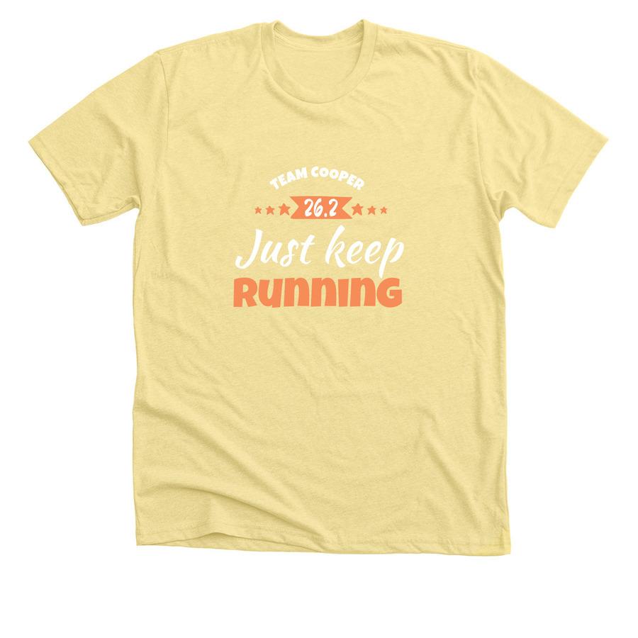 A light yellow marathon shirt that says, "Just keep running".