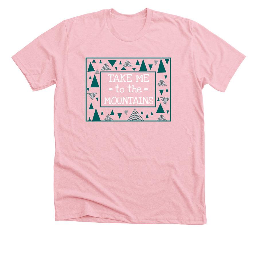 A pink nature t-shirt that says, "Take me to the mountains".