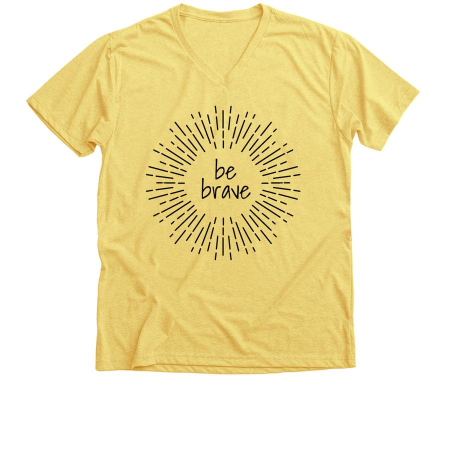 A banana cream shirt with text that says "be brave" and a sunburst border