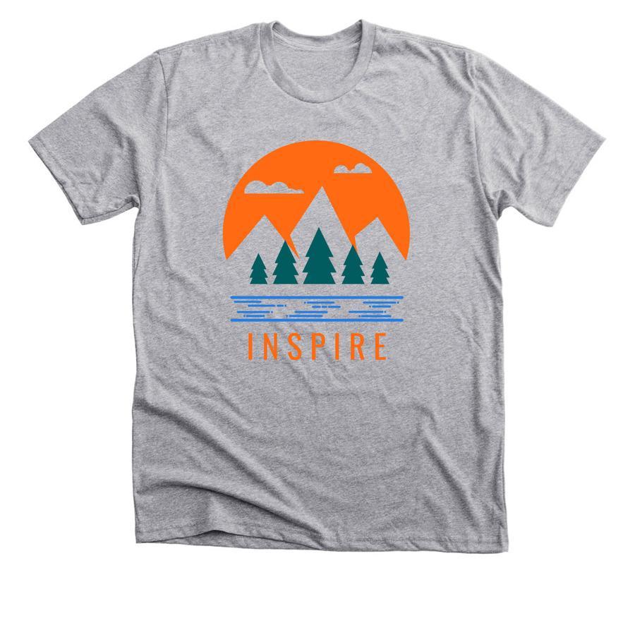 A dark heather gray shirt with trees and mountains images and text that says "inspire".