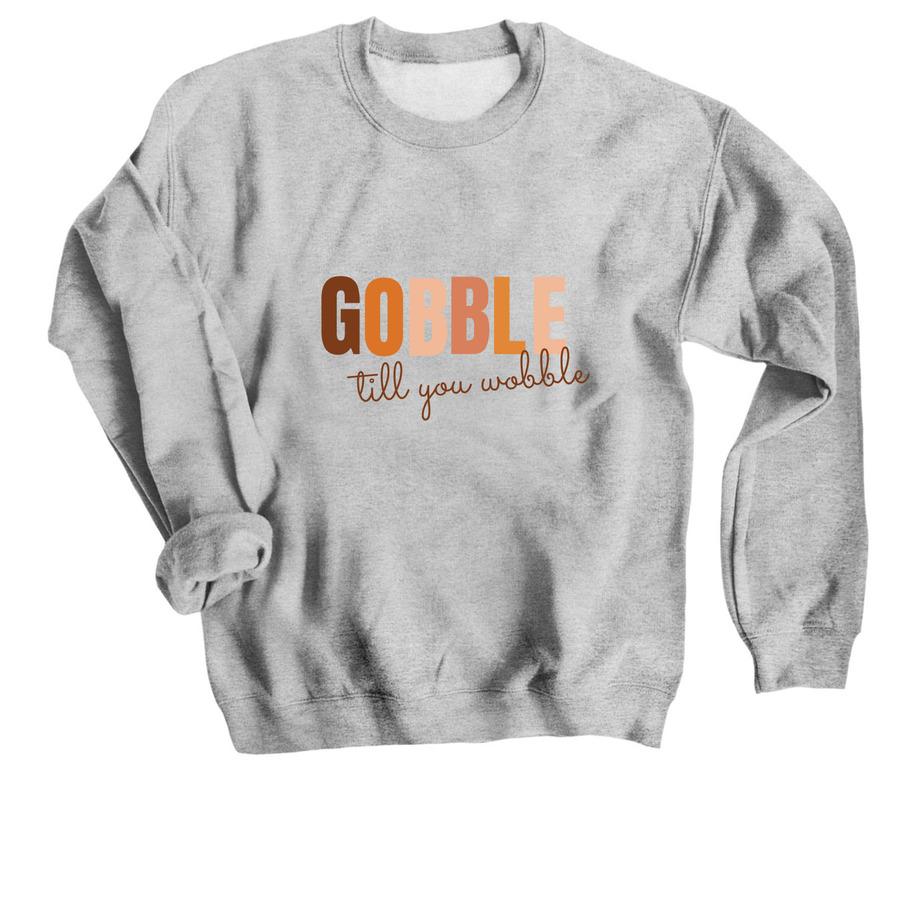 A fall t-shirt design that says, "Gobble till you wobble".