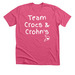 Team Crocs & Crohn's 2026, a Heather Charity Pink Premium Unisex Tee