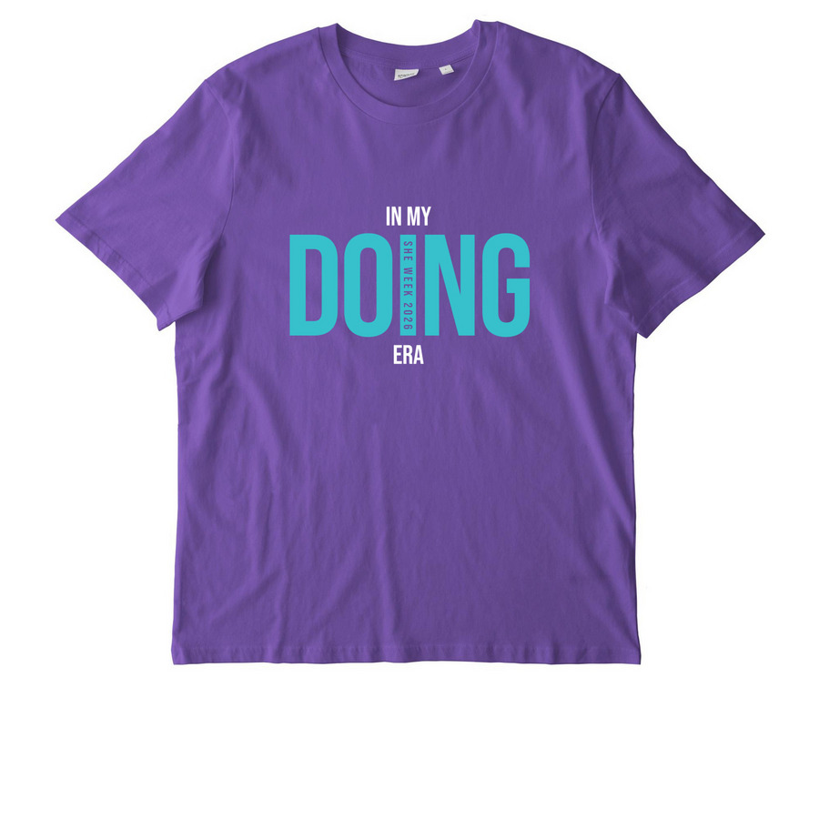 IN MY DOING ERA, a Purple Love Stanley/Stella Unisex Creator 2.0 Tee