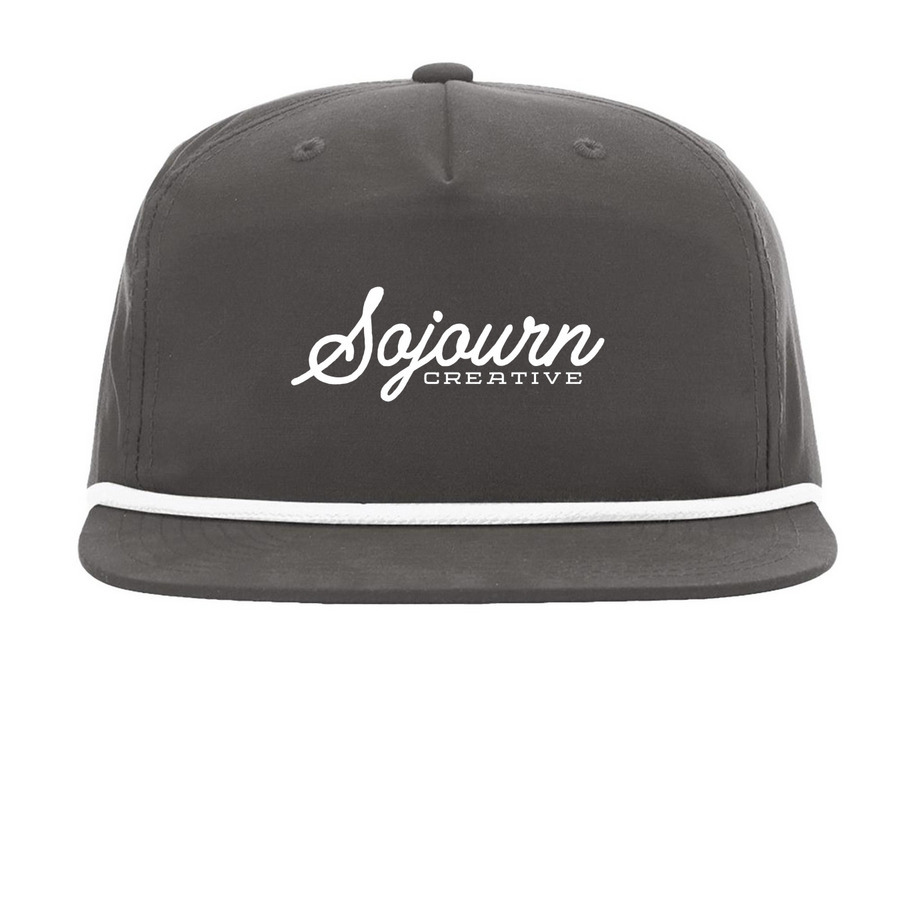Sojourn Snapback, a Charcoal/ White Printed Umpqua Snapback Cap