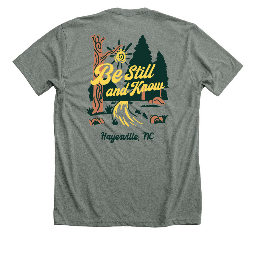 The Still Place Be Still and Know, a Deep Heather Premium Unisex Tee (back-view)