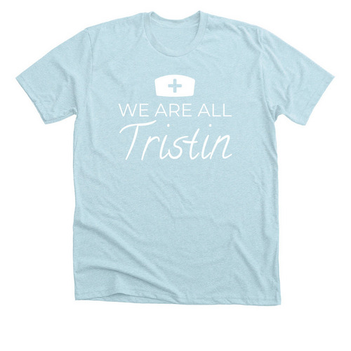 WE ARE ALL TRISTIN 1, a Heather Ice Blue Premium Unisex Tee