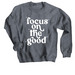 Focus On The Good, a Dark Heather Crewneck Sweatshirt