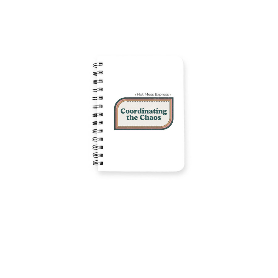 Coordinating the Chaos Notebook, a White Spiral Notebook