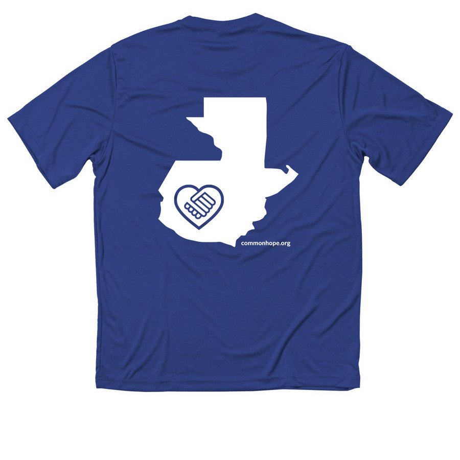 Travel Volunteer Performance Tee, a True Royal Classic Performance Tee (back-view)
