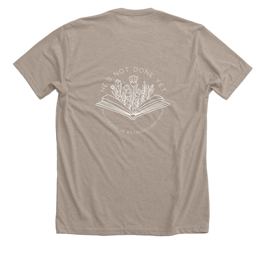 He?s Not Done Yet, a Heather Stone Premium Unisex Tee (back-view)