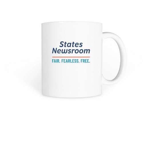 Drink up the news, a White Coffee Mug
