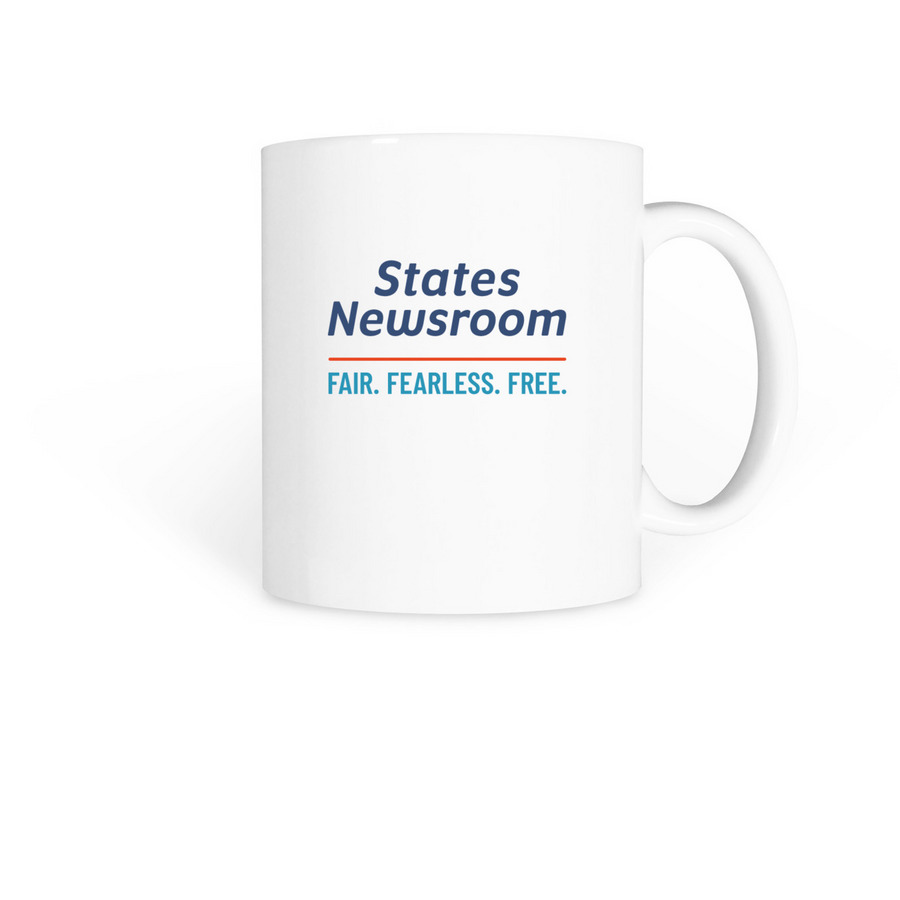 Drink up the news, a White Coffee Mug