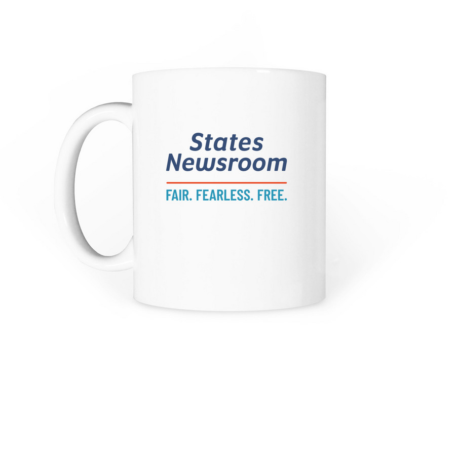 Drink up the news, a White Coffee Mug (back-view)